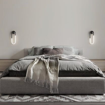 LED-Wandleuchte mit geschwungenem Acrylrahmen