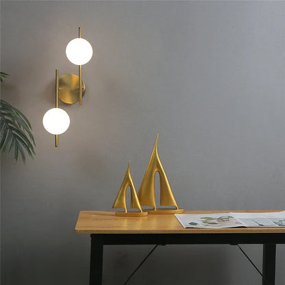 Astra Gold Frosted Globe Wall Light