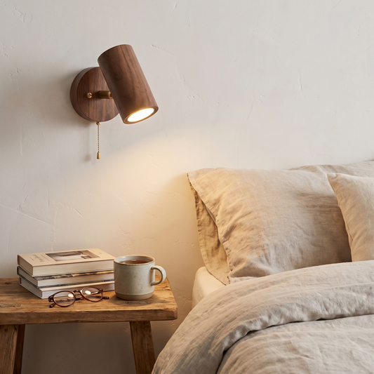 Arlo Walnut & Brass LED Wall Spotlight in a lifestyle setting
